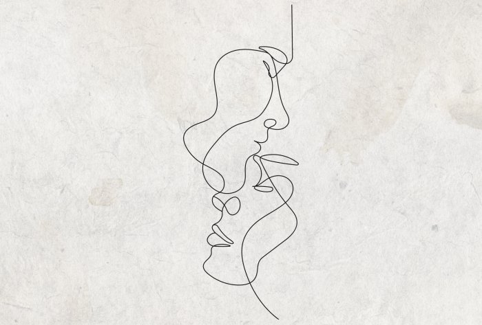 Papier peint  Visages dessinés au trait sur un fond en béton