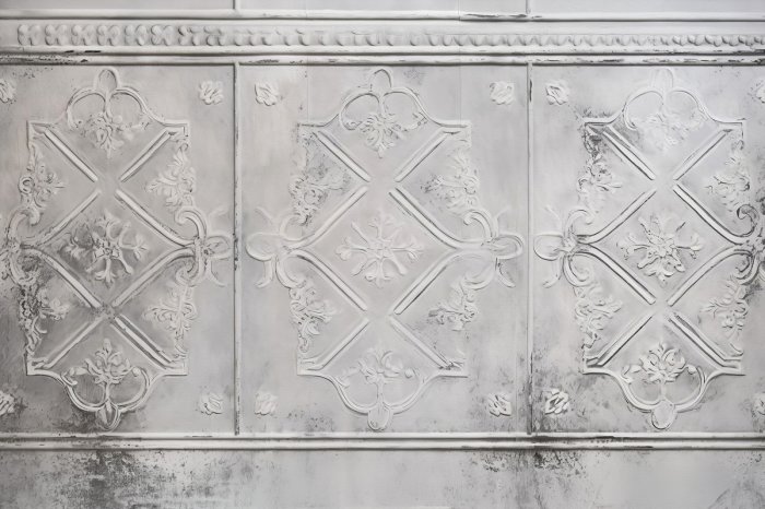 Papier peint  Mur gris brut avec décorations