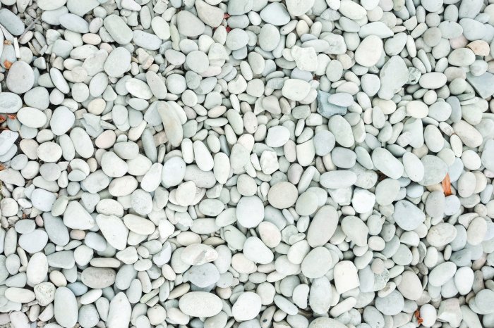 Papier peint  Pierres blanches sur la plage