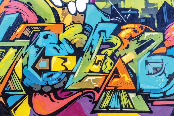 Papier peint  Graffiti artistique coloré sur le mur