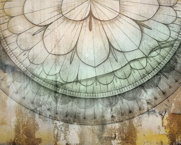 Papier peint  Mandala sur un fond en béton dans un style rétro