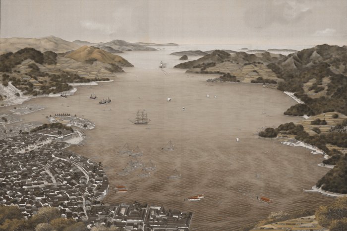 Papier peint  Vue sur une ville côtière entourée de montagnes