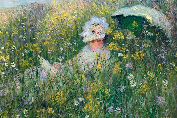 Tableau  Une femme avec un livre dans une prairie fleurie.