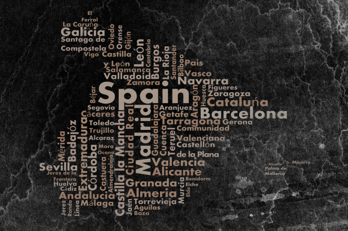 Tableau  Une carte de l&#39;Espagne composée de mots agencés sur un fond sombre.