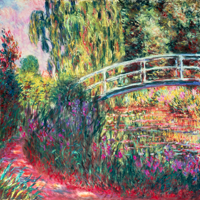 Tableau  Un pont de pierre reliant des arbres en fleurs en harmonie avec la nature