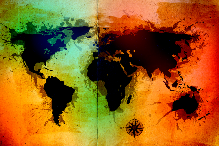 Tableau  Une carte du monde aux couleurs intenses avec des continents noirs.