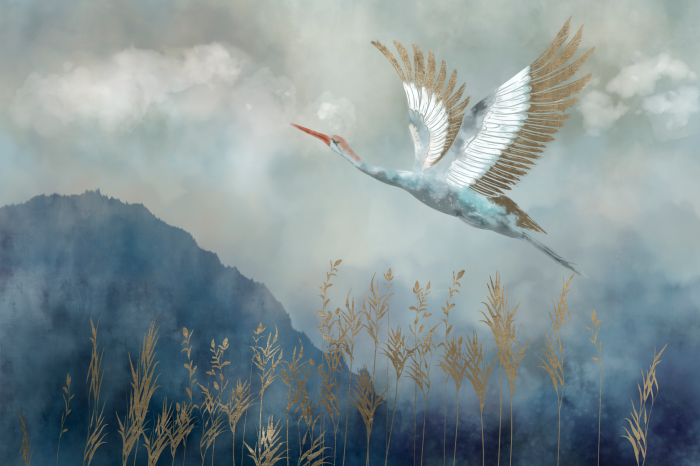 Tableau  Une grue en vol se détachant sur un ciel gris et des montagnes