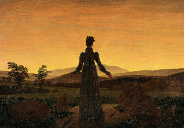 Tableau  Une femme se détachant sur un majestueux coucher de soleil en montagne