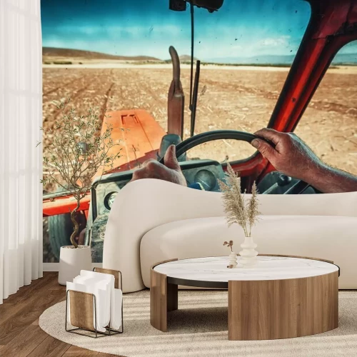 Papier peint  Closeup mains de fermier, se trouve à l'intérieur dans la cabine du tracteur