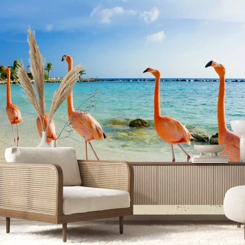 Papier peint  Flamants roses marchant sur la plage