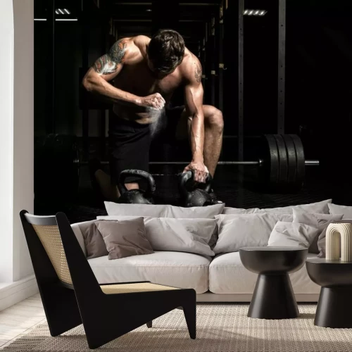 Papier peint  Homme musclé soulevant des poids