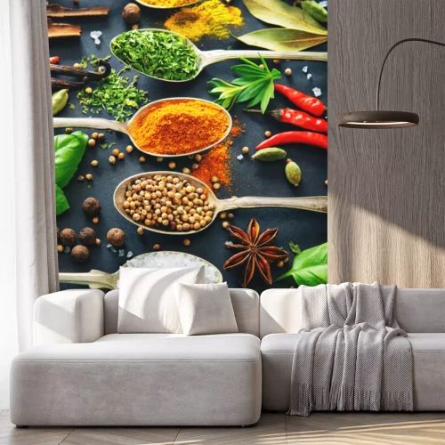 Sticker  Cuillères avec des épices sur un fond sombre