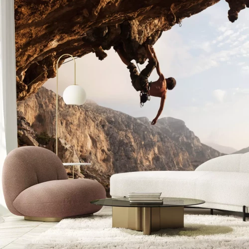 Papier peint  Un homme sportif sur les rochers