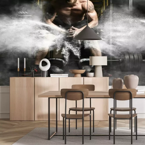 Papier peint  Homme à la salle de sport et haltère