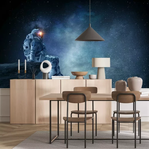 Papier peint  Astronaute assis sur un rocher