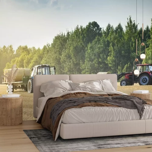 Papier peint  Des machines agricoles sur un champ doré chanfreiné déplacent des balles de foin après la récolte de céréales. Le tracteur charge les balles de foin sur la remorque. Concept de récolte.