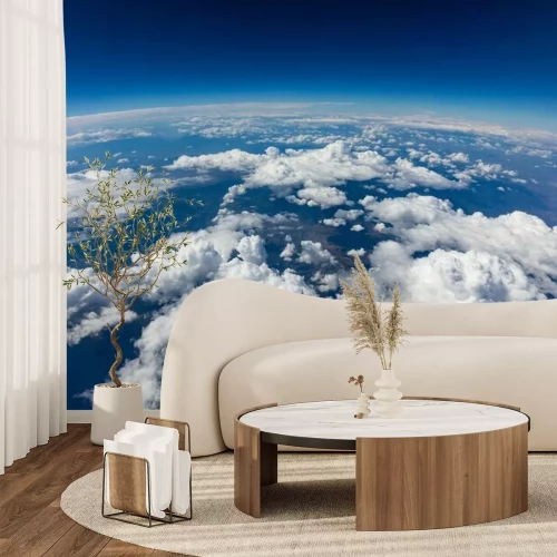 Papier peint  Nuages au-dessus de la Terre