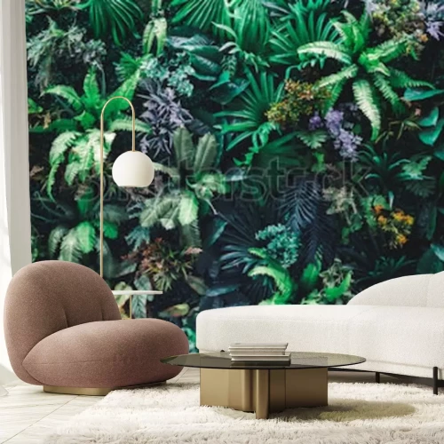 Papier peint  Feuilles vertes tropicales dans le jardin