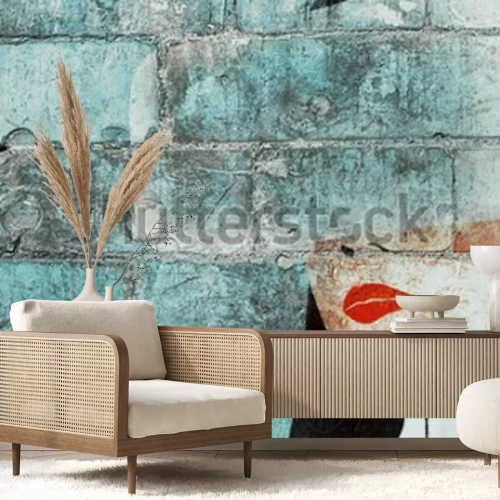 Papier peint  Visage de femme peint sur un mur