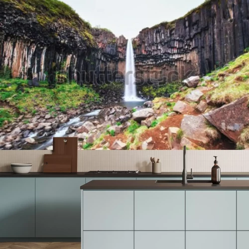 Papier peint  Paysage avec une chute d'eau parmi les rochers