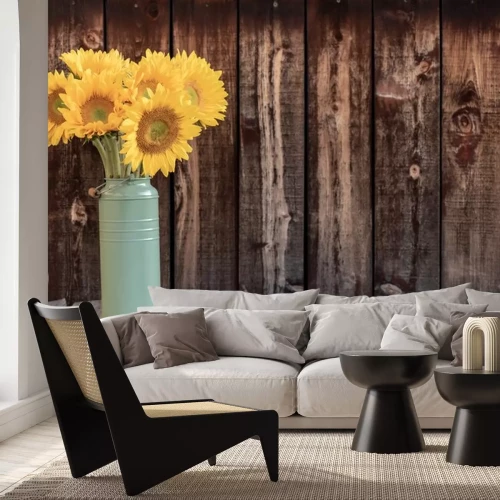 Sticker  Un bouquet de tournesols sur un fond en bois