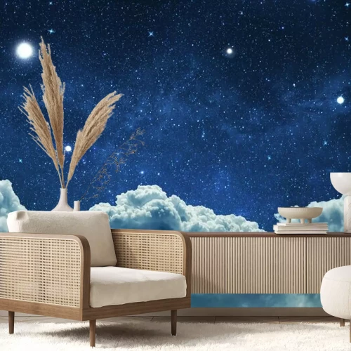 Papier peint  Des nuages cotonneux dans un ciel étoilé de nuit