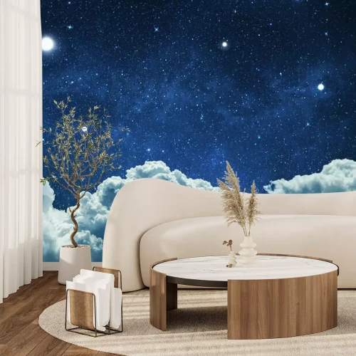 Sticker  Des nuages cotonneux dans un ciel étoilé de nuit