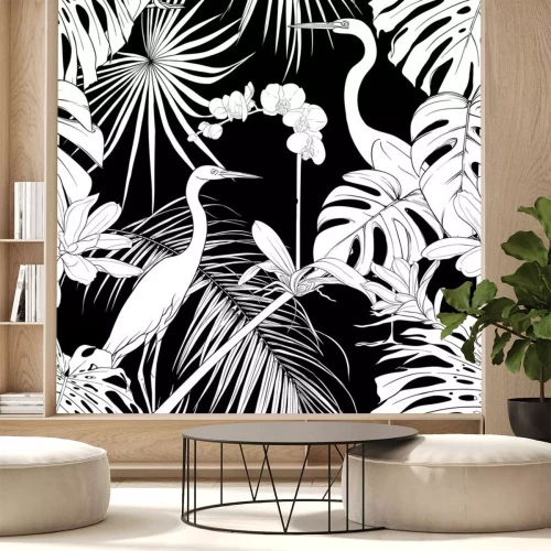 Sticker  Oiseaux noirs et blancs parmi la végétation tropicale