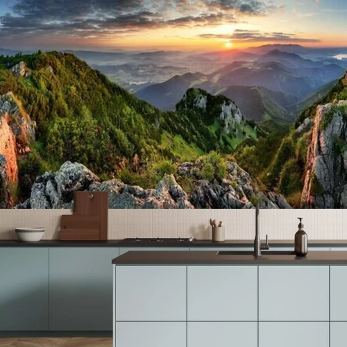 Papier peint  Vue d'un lever de soleil dans les montagnes