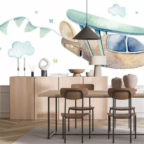 Sticker  Un avion en bois tirant des drapeaux derrière lui