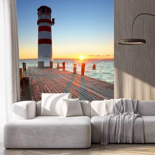 Papier peint  Phare avec une passerelle le soir