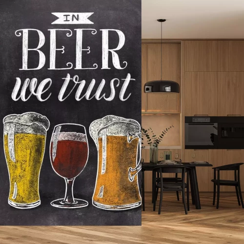 Sticker  In beer we trust hand drawn lettering with beer glasses on black chalkboard background. Vintage food illustration.
