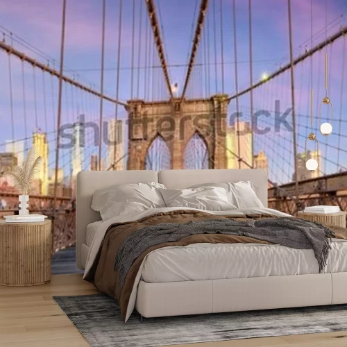 Papier peint  New York, New York on the Brooklyn Bridge Promenade facing Manhattan's skyline at dawn.