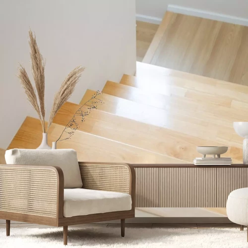 Sticker  The design of staircase inside the house are paved with light brown wood laminate.