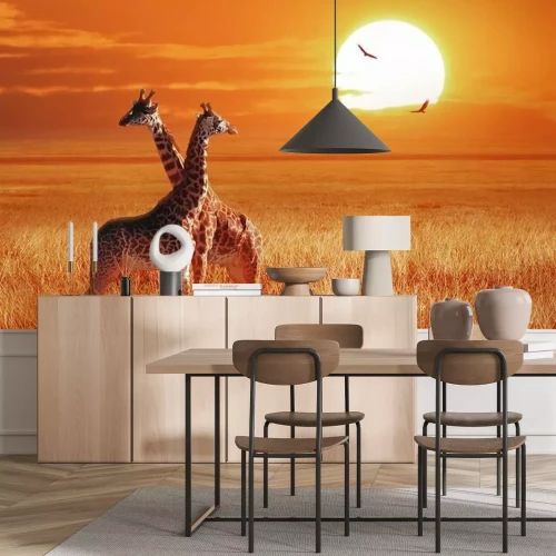 Papier peint  Group of giraffe at sunset in the Serengeti National Park. Tanzania. Wild nature of Africa. African artistic landscape.