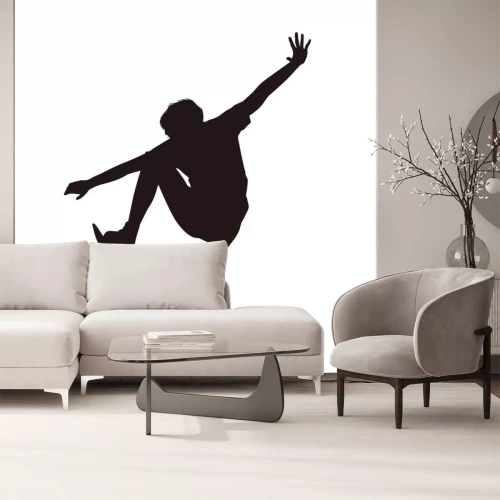 Sticker  Silhouette noire d'un garçon avec un skateboard