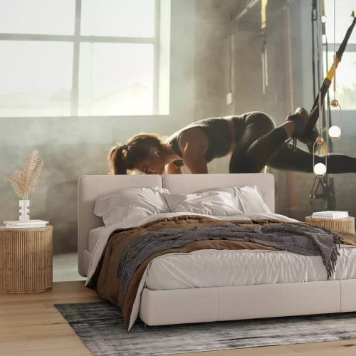 Papier peint  Femme s'entraînant avec des sangles TRX