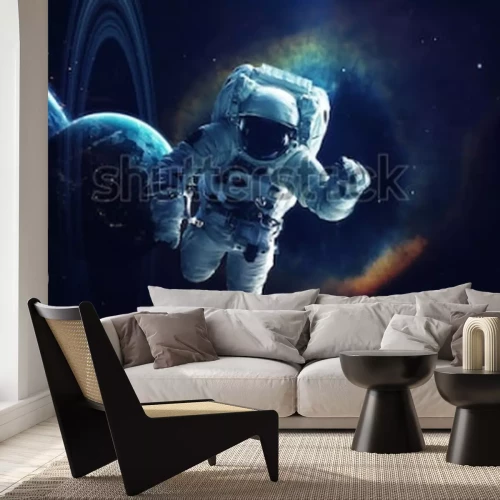 Papier peint  L'espace et un astronaute