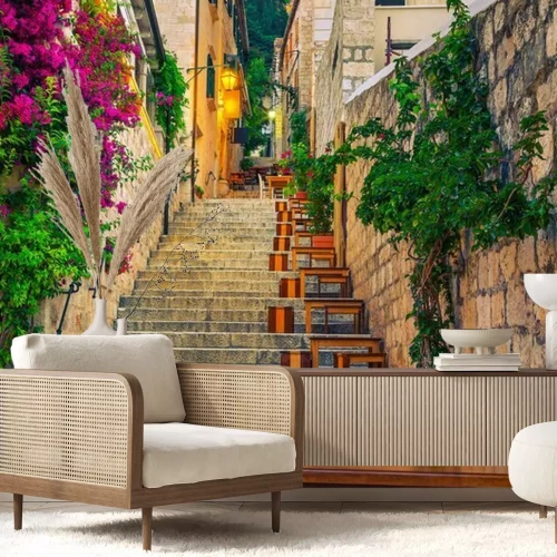 Papier peint  Narrow street and street cafe decorated with flowers, Hvar, Croatia