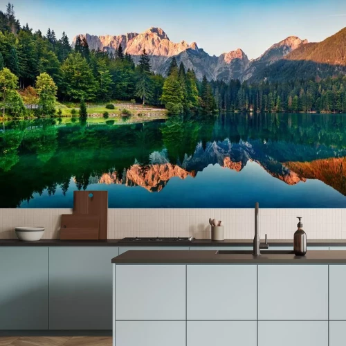 Papier peint  Calm morning view of Fusine lake. Colorful summer sunrise in Julian Alps with Mangart peak on background, Province of Udine, Italy, Europe. Beauty of nature concept background.