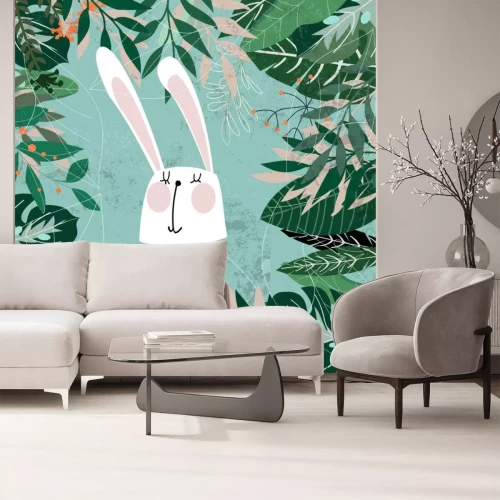 Sticker  Lapin blanc au milieu de feuilles tropicales