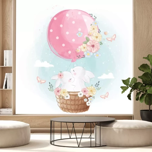 Sticker  Couple de lapins blancs volant avec un ballon