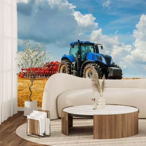 Papier peint  Blue new tractor with red harrow in the field against a cloudy sky, agricultural machinery work