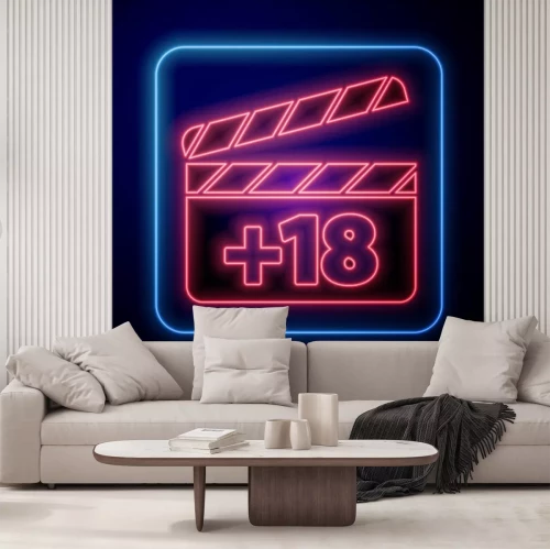 Sticker  Glowing neon Movie clapper with 18 plus content icon isolated on blue background. Age restriction symbol. Adult channel. Vector Illustration