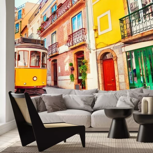 Papier peint  Yellow vintage tram on the street in Lisbon, Portugal. Famous travel destination