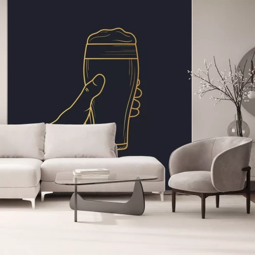 Sticker  Hand holding a golden glass of beer with foam. Vector isolated illustration. Icon for night bar background. Gold label for brewery.