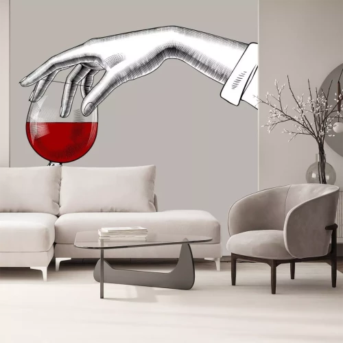 Sticker  Woman's hand holding a glass with red wine