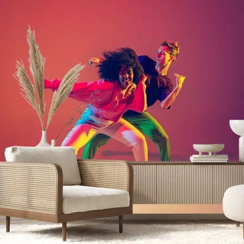 Papier peint  Couple hip-hop dansant dans une pose dynamique