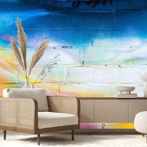 Sticker  A fragment of colorful graffiti painted on a brick wall. Abstract backdrop for design.