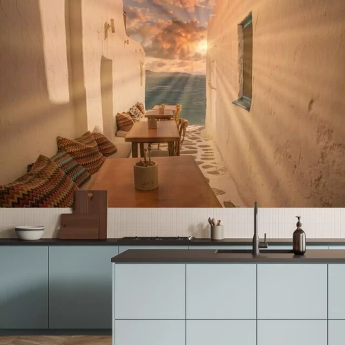 Papier peint  Benches with pillows in a typical Greek bar in Mykonos town with sea view, Cyclades islands, Greece. Travel concept.